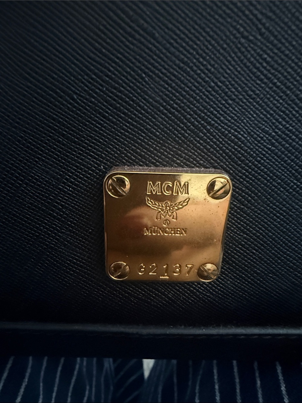 MCM Black Leather Shoulder Bag with Gold Logo Plate
